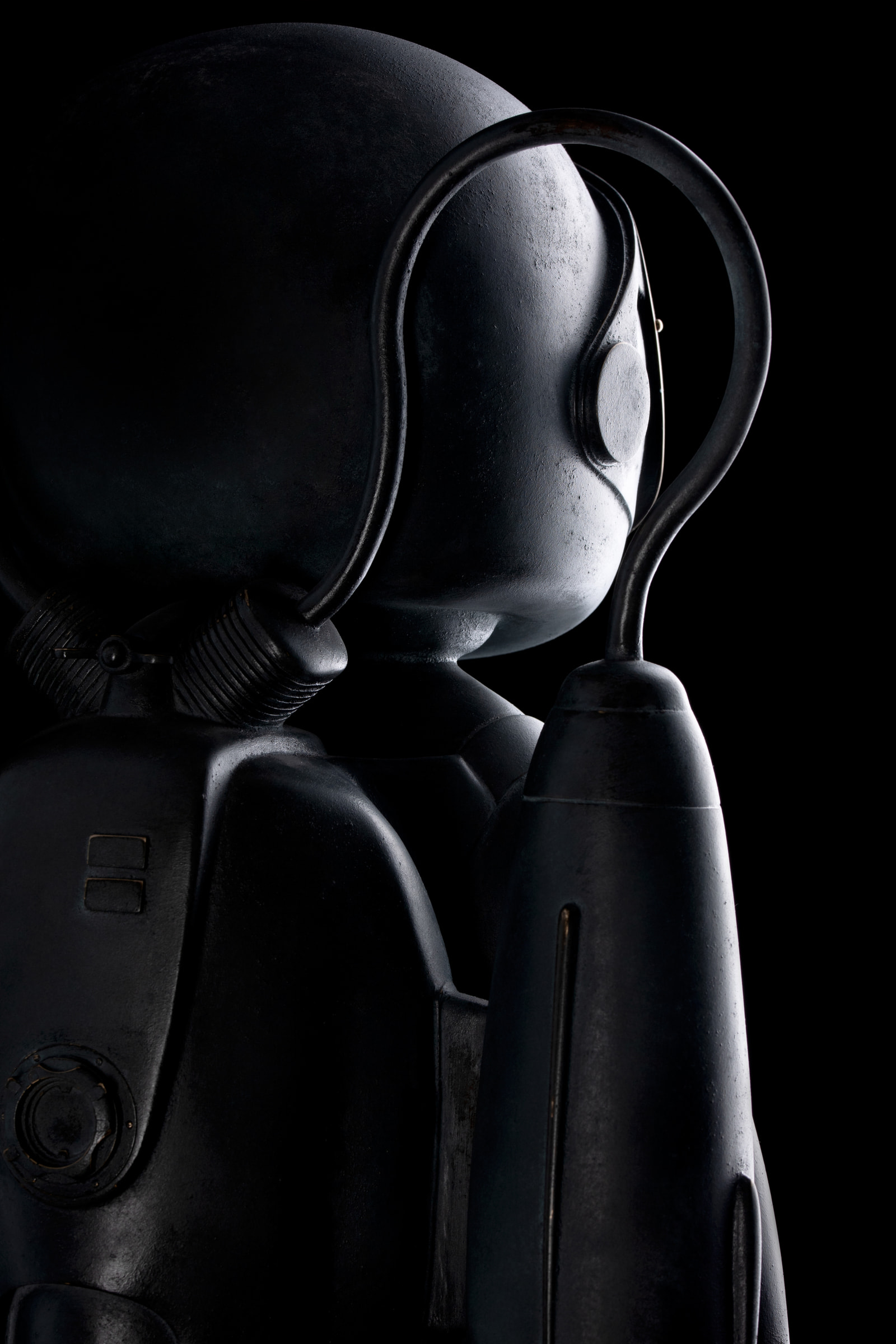 Drim 2026 — detail, helmet and backpack in low light