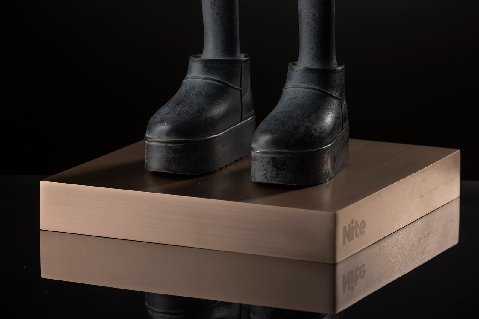 Nite — Uggs on the engraved plinth